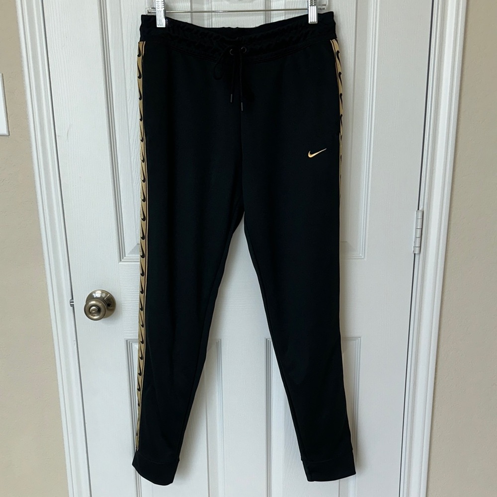 NWT Nike Black women’s Joggers with Gold Accents Size Medium